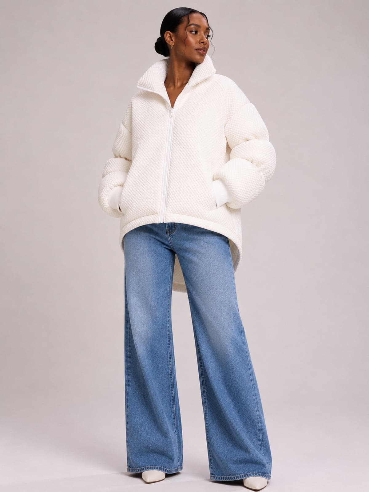 The Mist Coat worn open over a pale layer