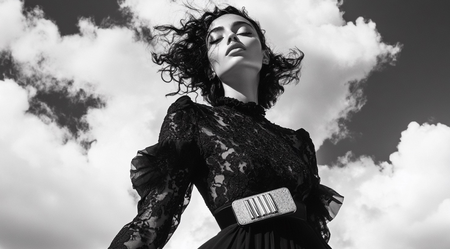White sculptural fashion look against a pale editorial backdrop